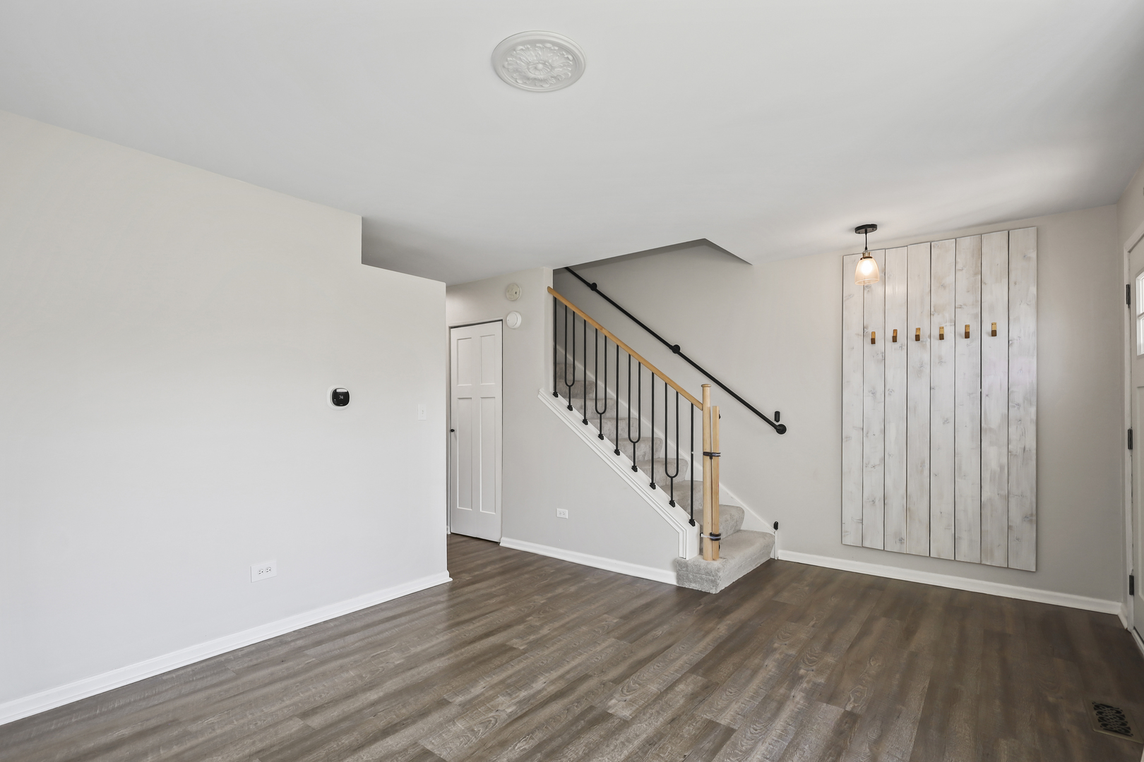2420 Roxbury Lane Montgomery, IL 60538 - Photo 6 of 25 a view of entryway with wooden floor