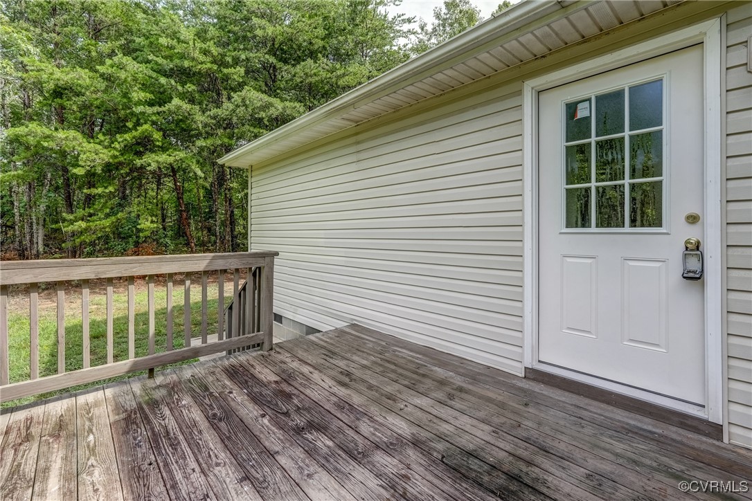 4385 Chappell Road Keysville, VA 23947 - Photo 21 of 29 a view of a wooden deck and a yard