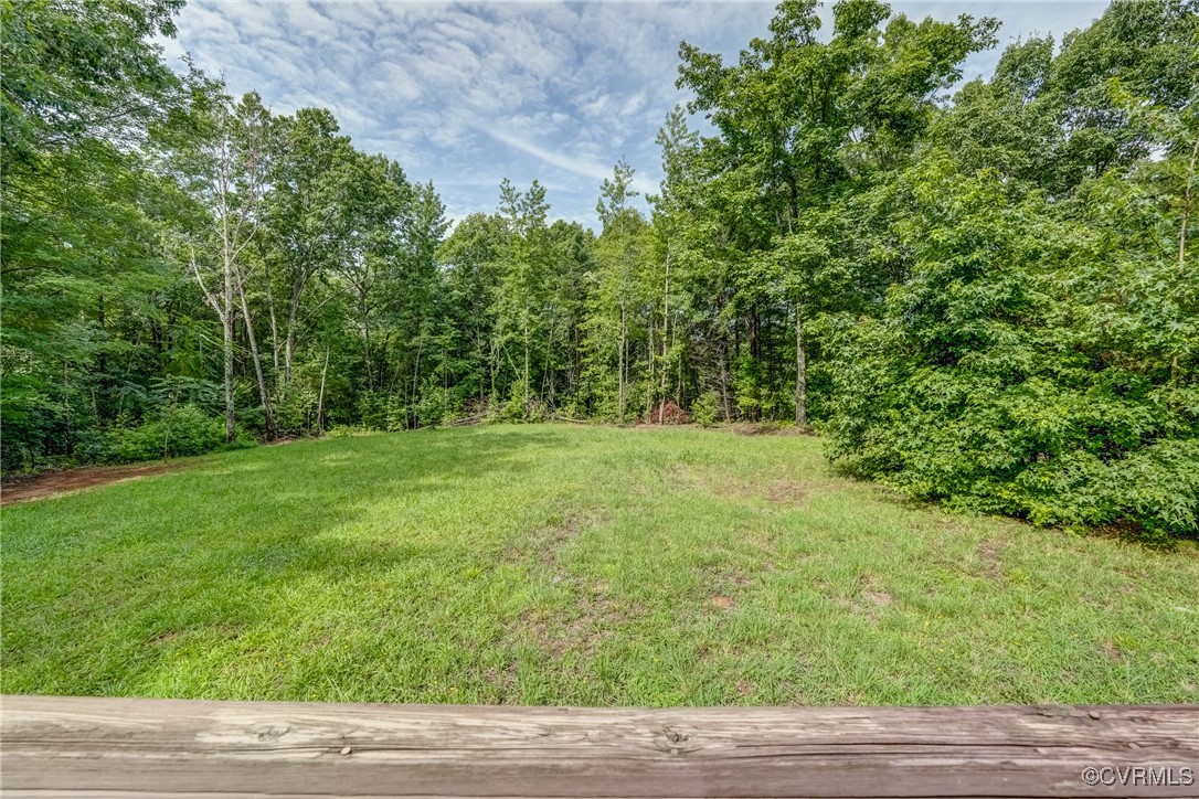 4385 Chappell Road Keysville, VA 23947 - Photo 27 of 29 a backyard of a house with lots of green space