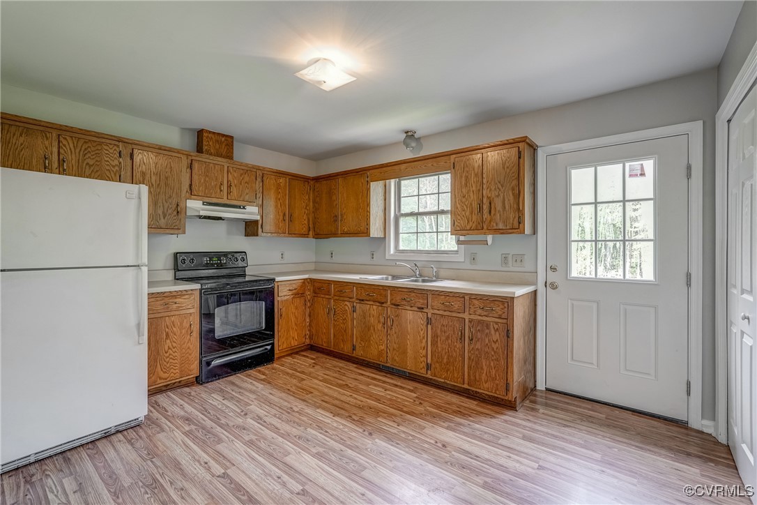 4385 Chappell Road Keysville, VA 23947 - Photo 5 of 29 a kitchen with granite countertop a refrigerator stove top oven and sink