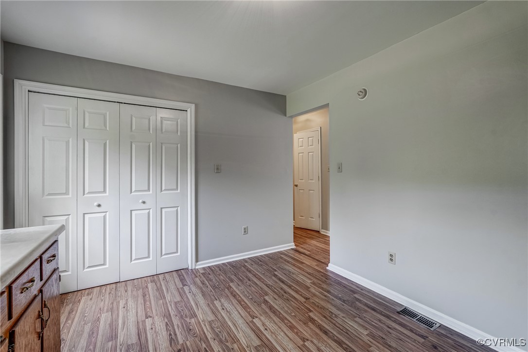 4385 Chappell Road Keysville, VA 23947 - Photo 7 of 29 wooden floor in an empty room