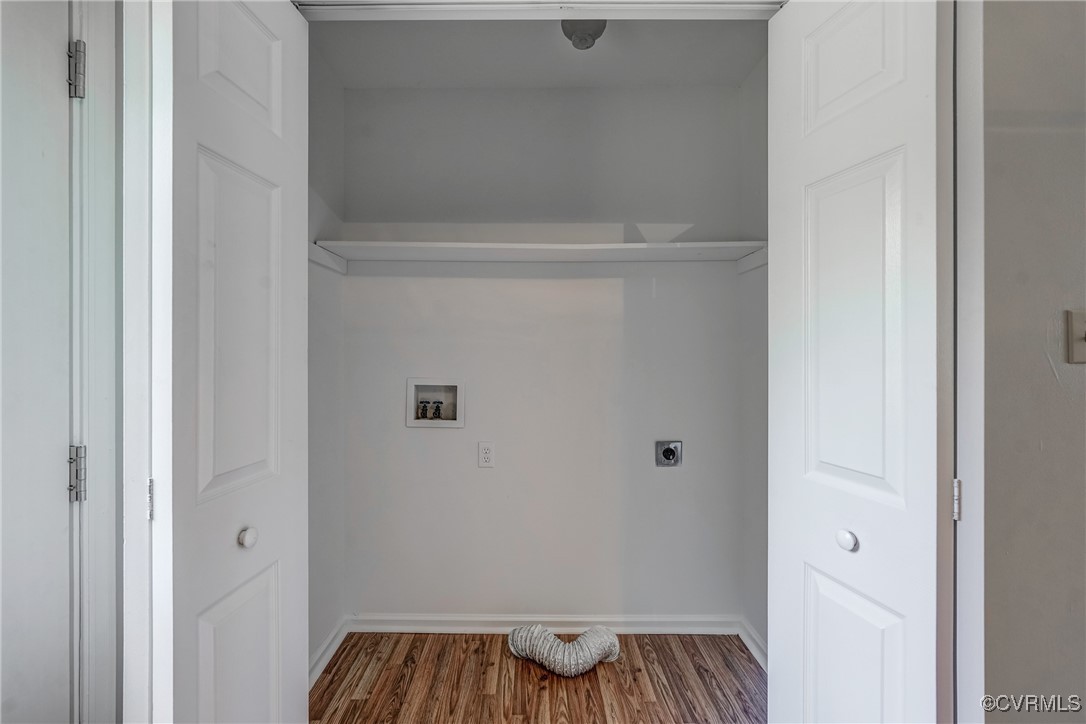 4385 Chappell Road Keysville, VA 23947 - Photo 9 of 29 a view of walk in closet with wooden floor