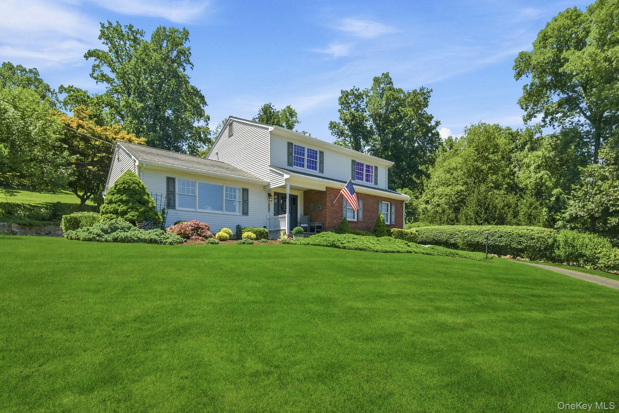 32 Bedell Road Katonah, NY 10536 - Photo 37 of 49 The home enjoys an elevated, private setting on 2.41 park-like acres, set well off the road.