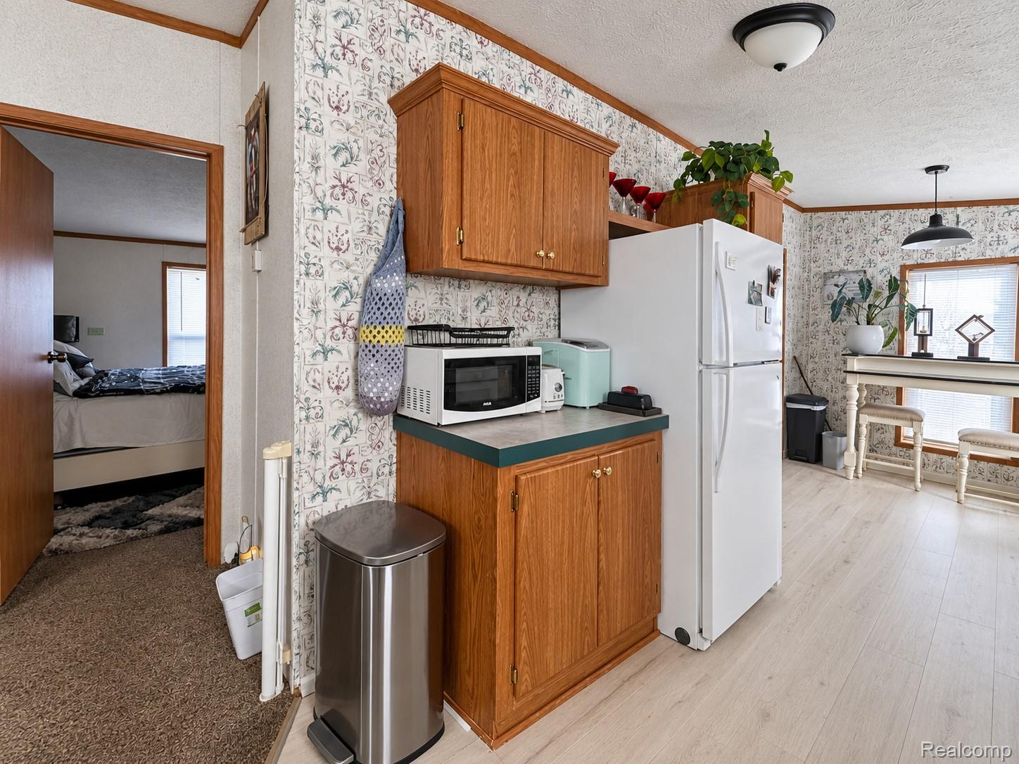 3488 Spring Street Carleton, MI 48117 - Photo 11 of 19 Kitchen_Bedroom_View.jpg