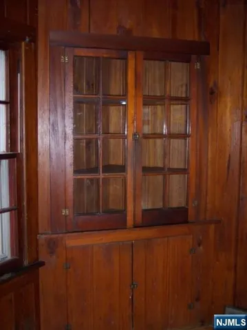 a view of a kitchen with a sink and a window
