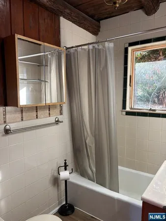 a view of street along with trees