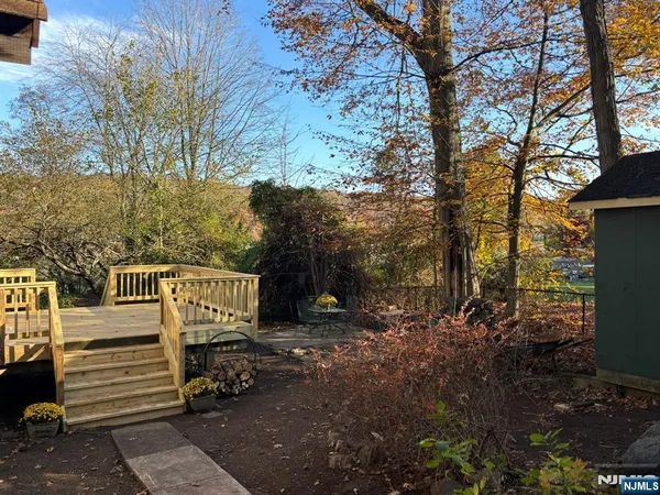 a view of a street with an outdoor space