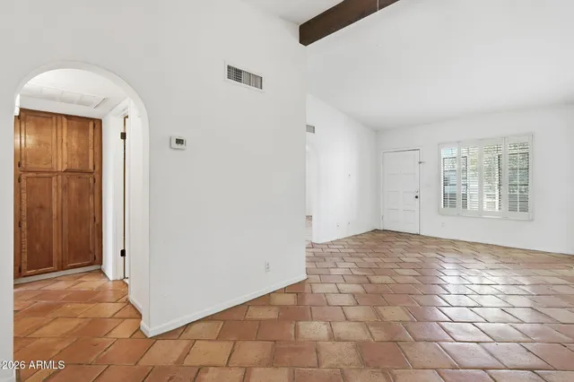 an empty room with windows