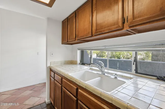 a kitchen with a sink and a cabinets