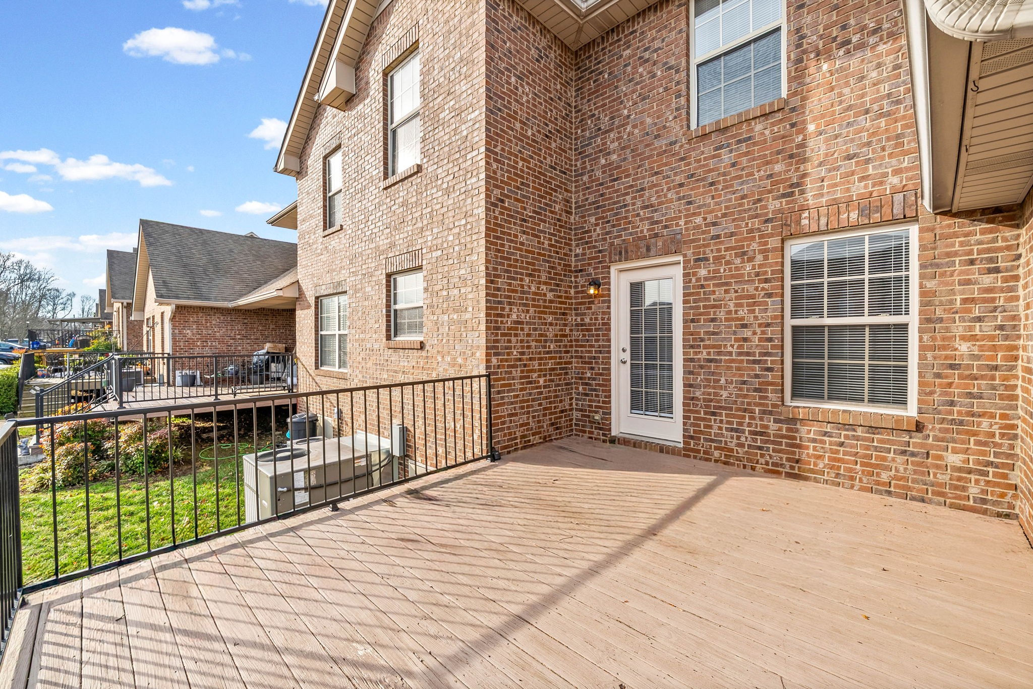 135 Excell Road, Unit 102 Clarksville, TN 37043 - Photo 22 of 24 a view of a brick building from a balcony