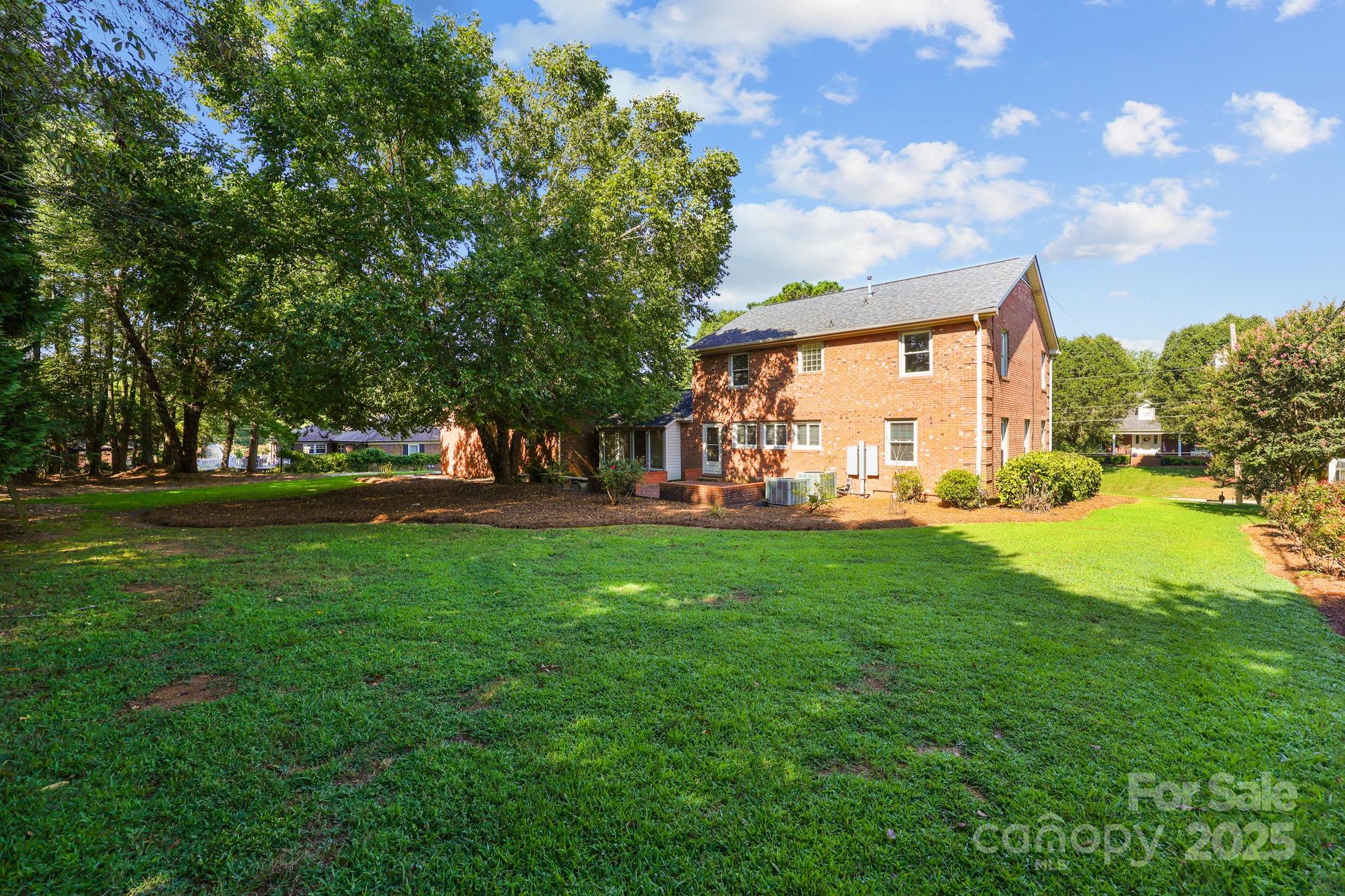 1202 Pineview Drive Albemarle, NC 28001 - Photo 22 of 41 a view of outdoor space with garden and trees