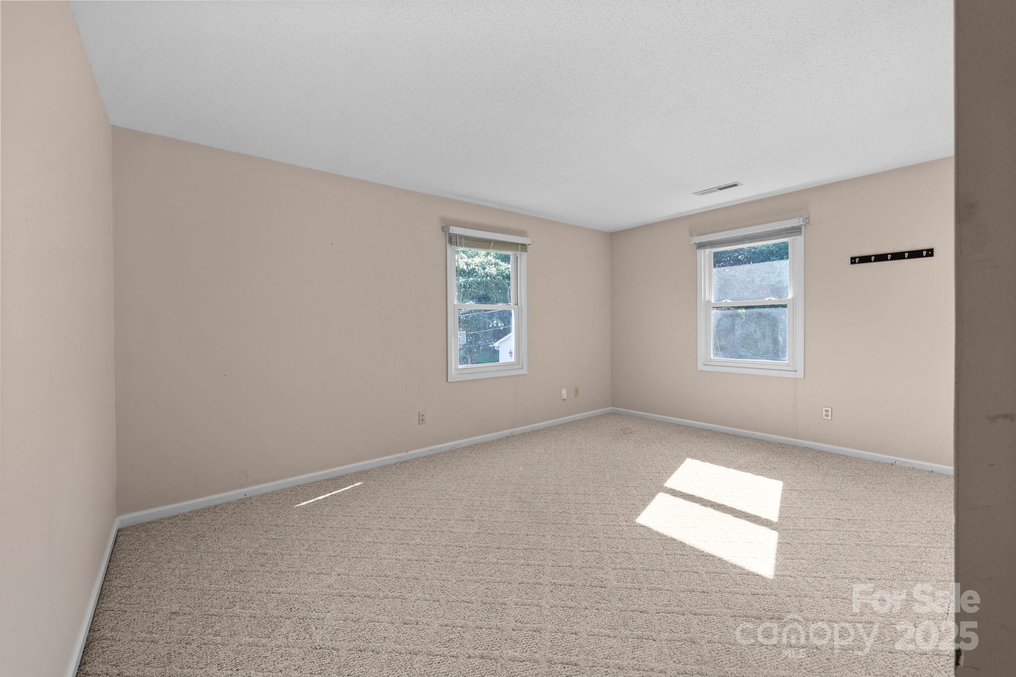 1202 Pineview Drive Albemarle, NC 28001 - Photo 32 of 41 an empty room with windows