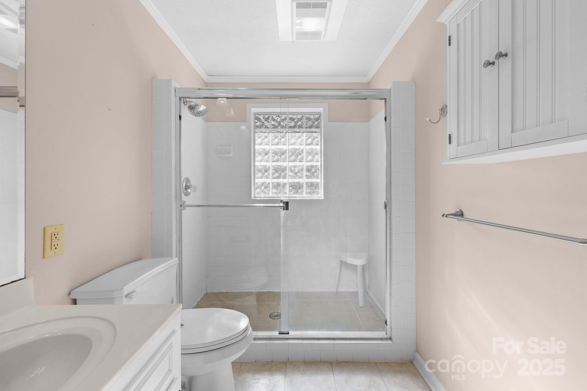 1202 Pineview Drive Albemarle, NC 28001 - Photo 41 of 41 a bathroom with a toilet and a shower