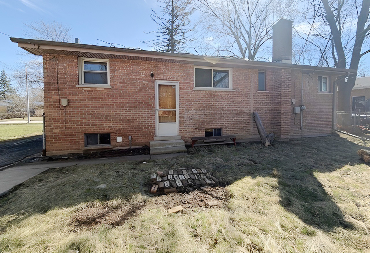 249 Eddy Street Chicago Heights, IL 60411 - Photo 10 of 10 a view of a house with a yard