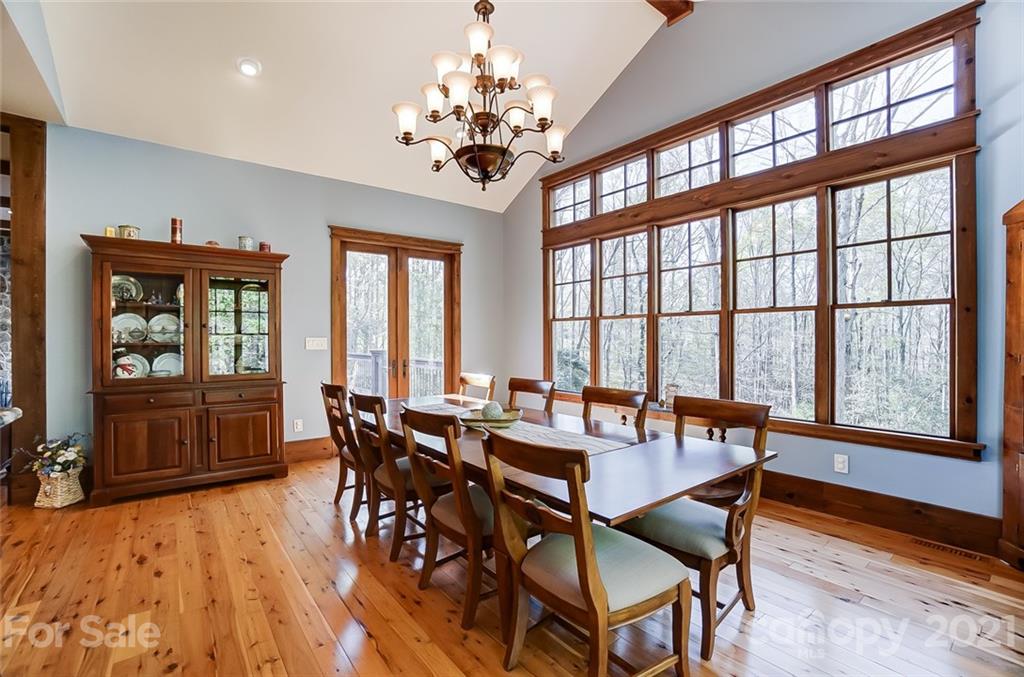 215 Eagle Cove Drive Cherryville, NC 28021 - Photo 14 of 48 a view of a dining room with furniture window and wooden floor