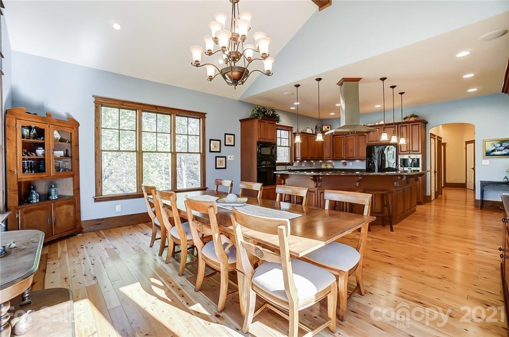 215 Eagle Cove Drive Cherryville, NC 28021 - Photo 16 of 48 a view of a dining room with furniture window and wooden floor