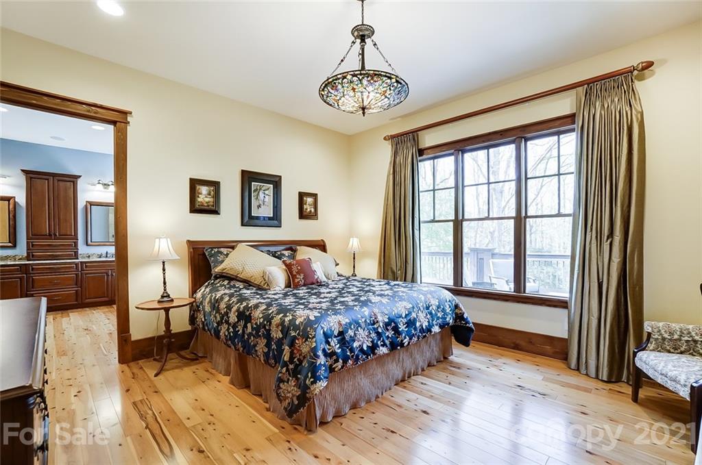 215 Eagle Cove Drive Cherryville, NC 28021 - Photo 17 of 48 a bedroom with a bed and a window