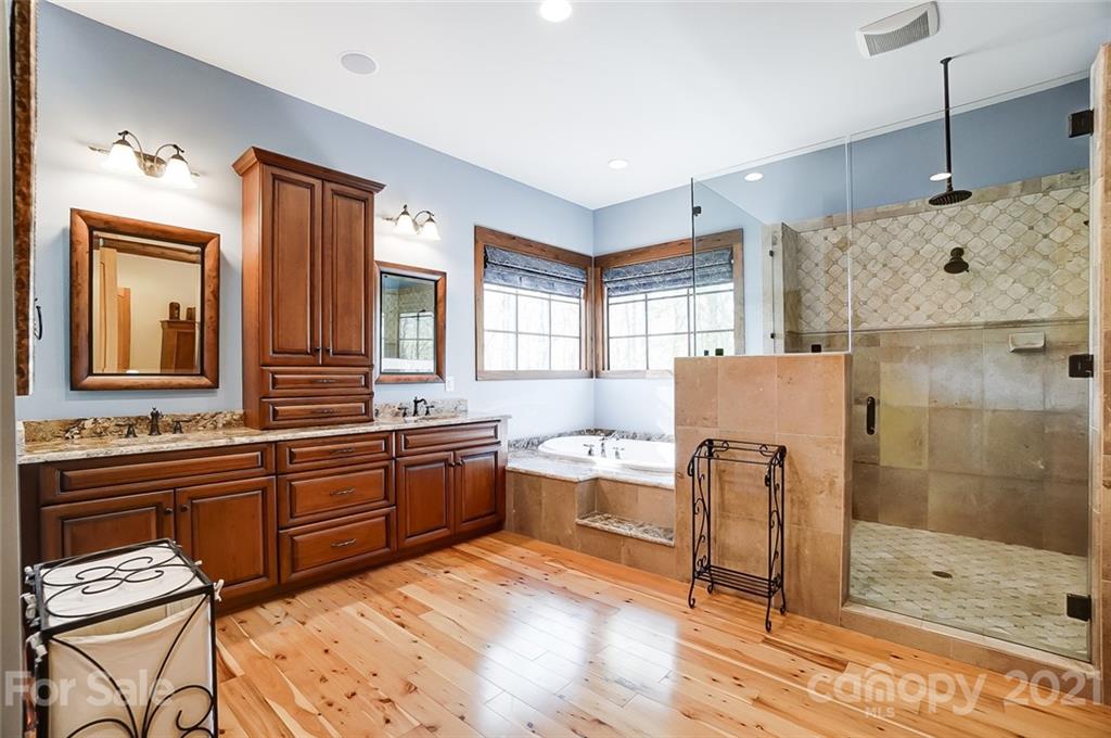 215 Eagle Cove Drive Cherryville, NC 28021 - Photo 20 of 48 a large kitchen with a sink and wooden cabinets