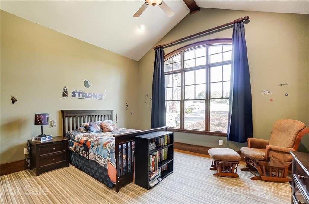 215 Eagle Cove Drive Cherryville, NC 28021 - Photo 21 of 48 a bedroom with furniture and a window