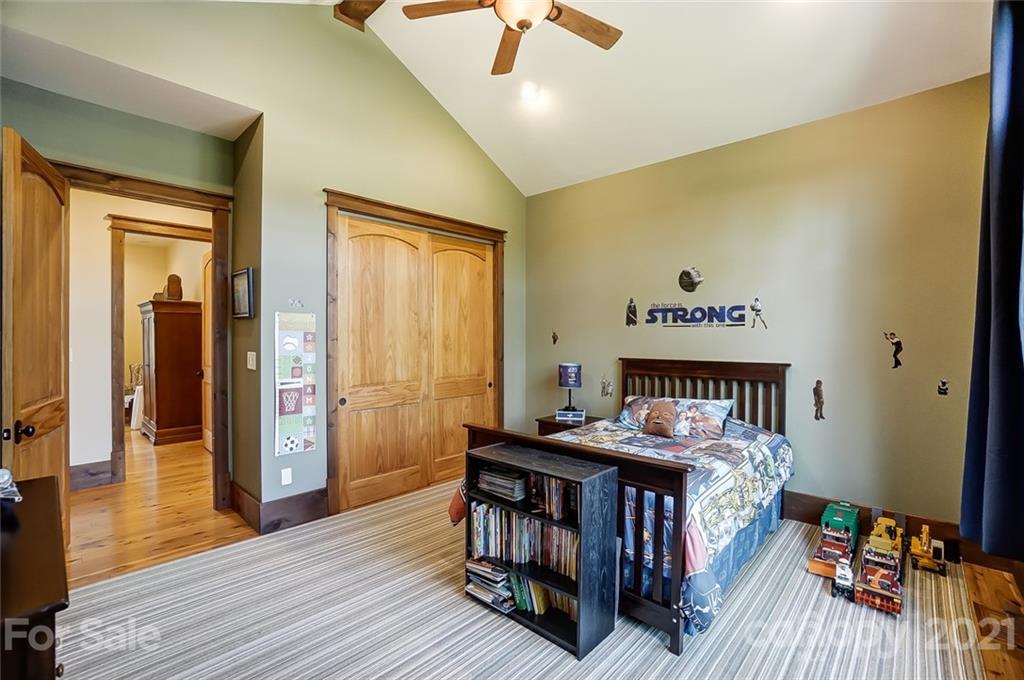 215 Eagle Cove Drive Cherryville, NC 28021 - Photo 22 of 48 a bedroom with furniture and wooden floor