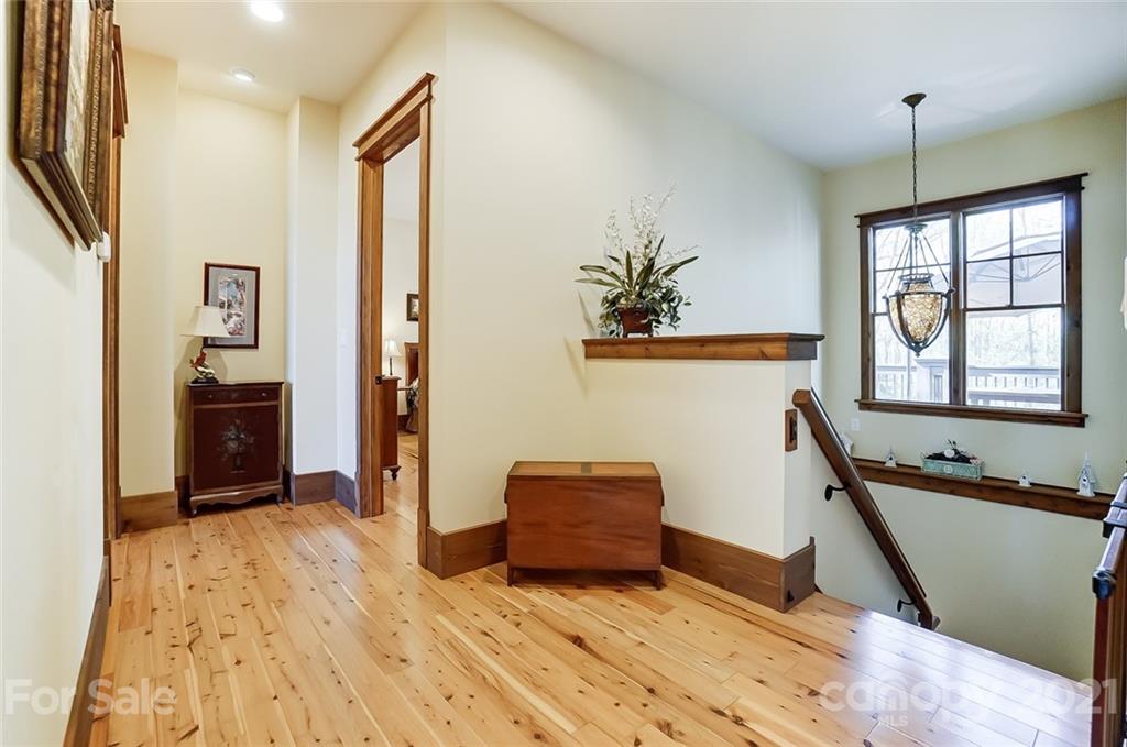215 Eagle Cove Drive Cherryville, NC 28021 - Photo 24 of 48 a bedroom with a bed and a dresser next to a window