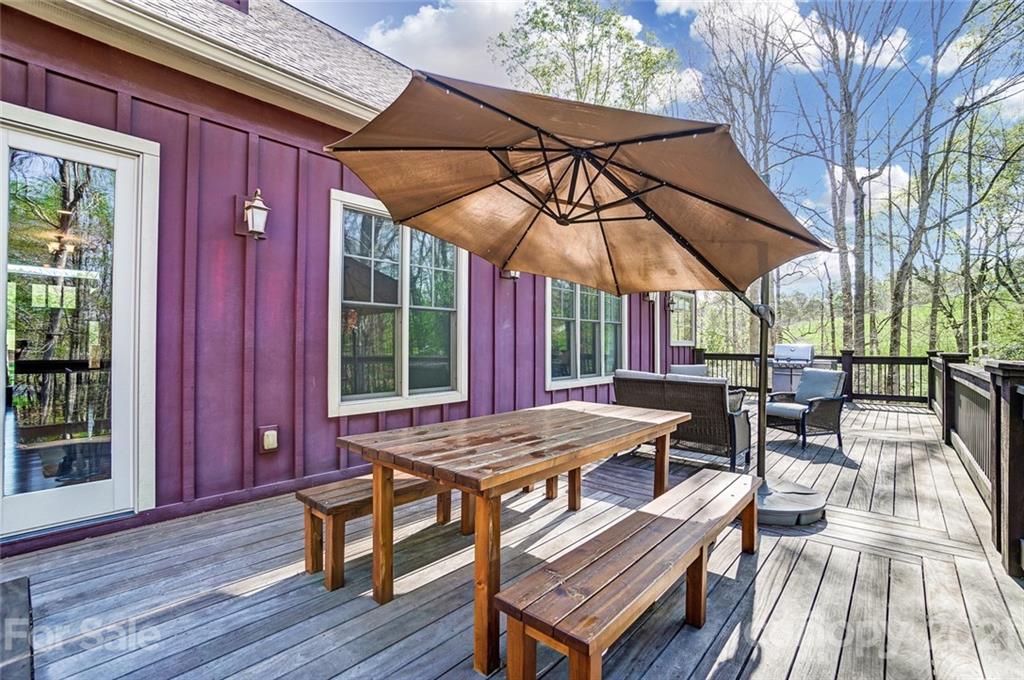 215 Eagle Cove Drive Cherryville, NC 28021 - Photo 37 of 48 a view of a chairs and table in the patio