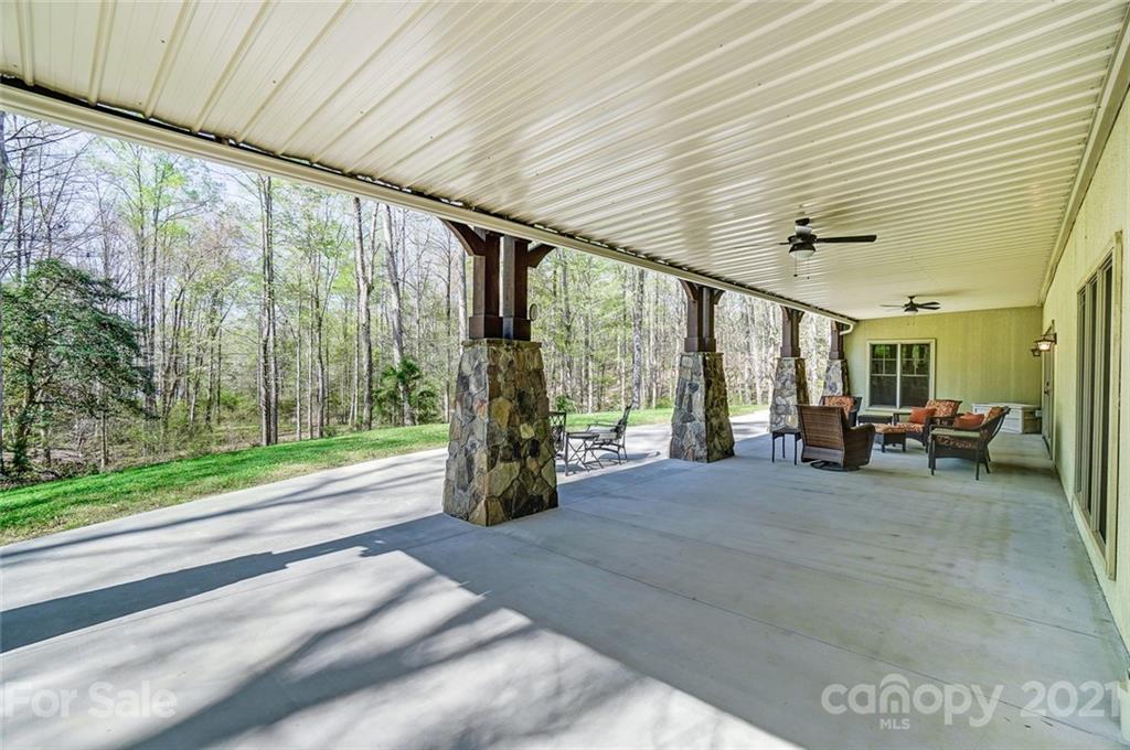 215 Eagle Cove Drive Cherryville, NC 28021 - Photo 39 of 48 a spacious bedroom with a large bed and a large window