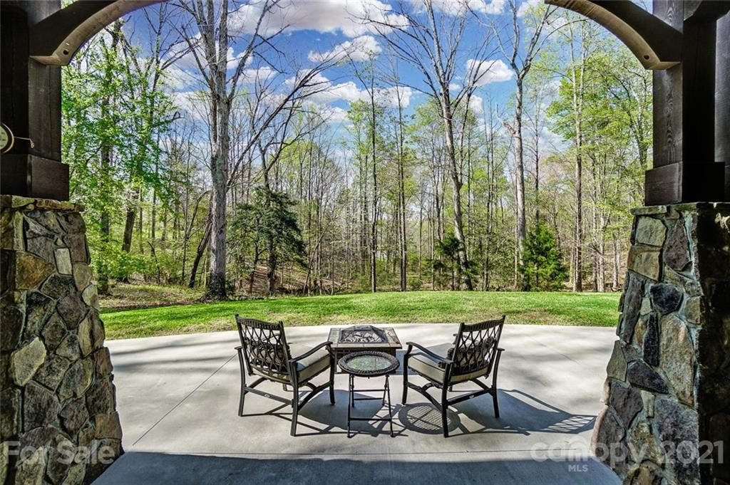 215 Eagle Cove Drive Cherryville, NC 28021 - Photo 41 of 48 a view of a chairs and table in the garden