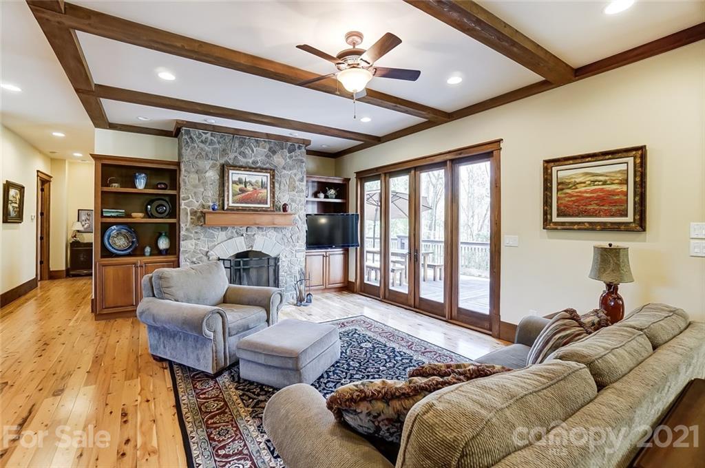215 Eagle Cove Drive Cherryville, NC 28021 - Photo 6 of 48 a bedroom with furniture and a fireplace