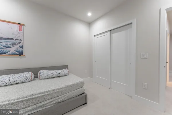a bedroom with a bed and furniture