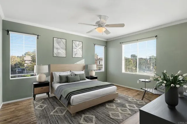 a bedroom with a large bed and a window