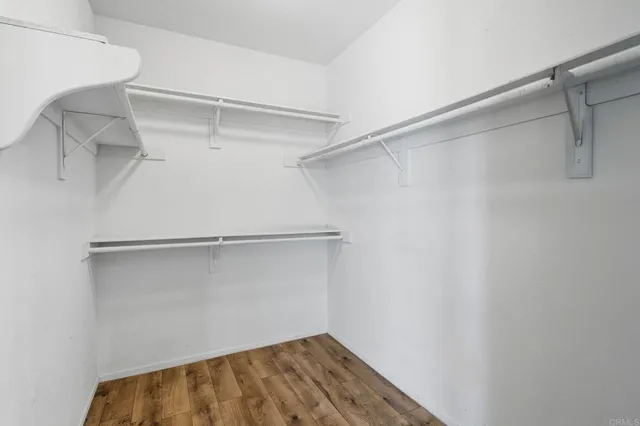 a view of an empty walk in closet