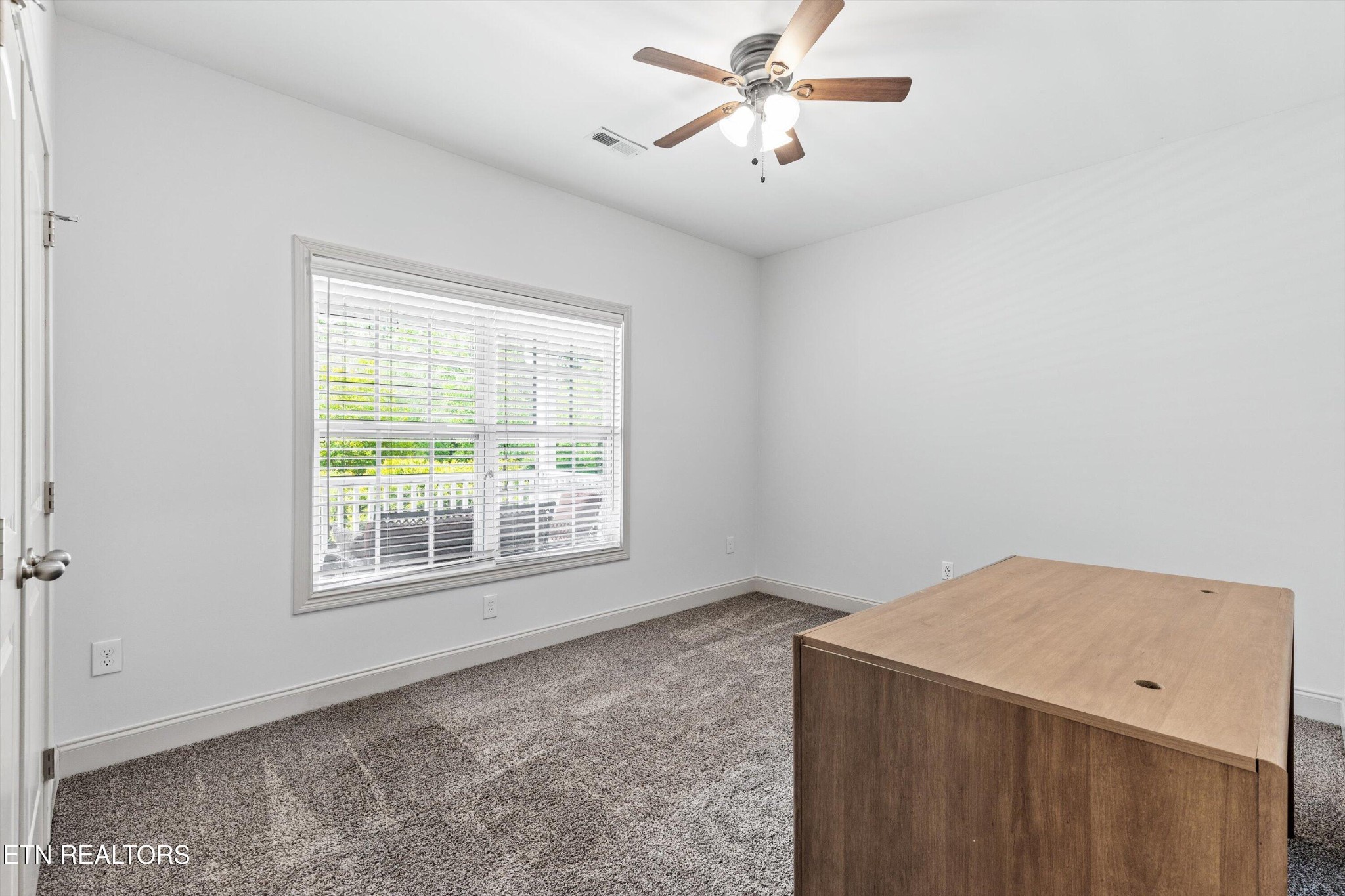 105 Cascade Lane Oak Ridge, TN 37830 - Photo 17 of 39 a view of an empty room with a window