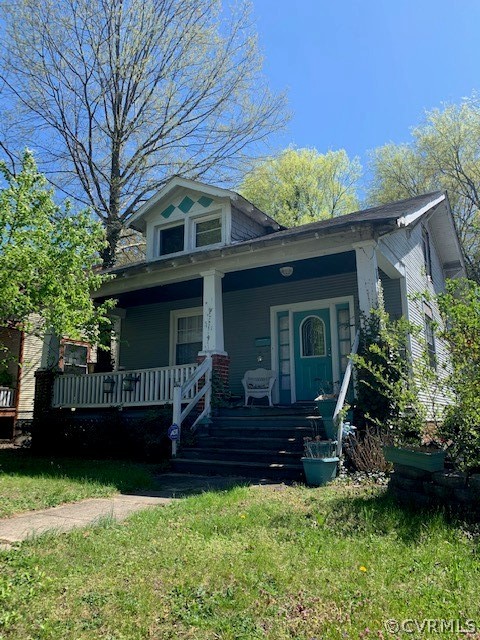 511 Pollock Street Richmond, VA 23222 - Photo 2 of 4 a front view of a house with a yard