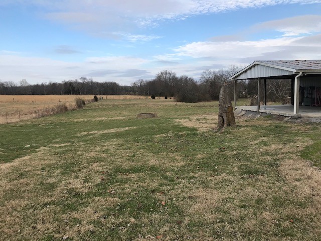 1931 Jarrell Road Lebanon, TN 37087 - Photo 13 of 35 a view of a lake with a big yard and large trees