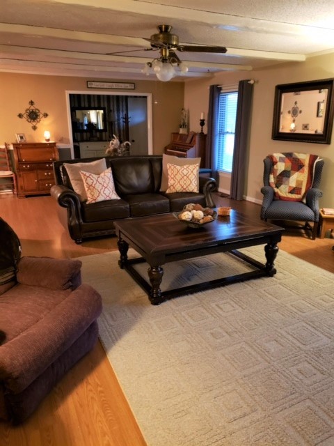 1931 Jarrell Road Lebanon, TN 37087 - Photo 20 of 35 a living room with furniture and a fireplace