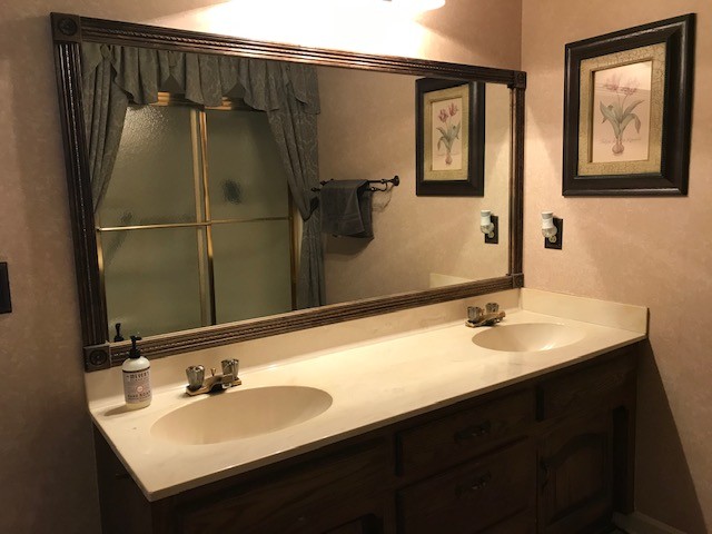 1931 Jarrell Road Lebanon, TN 37087 - Photo 24 of 35 a bathroom with a sink vanity and mirror
