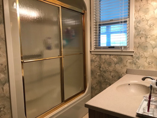 1931 Jarrell Road Lebanon, TN 37087 - Photo 30 of 35 a bathroom with a bathtub and a shower