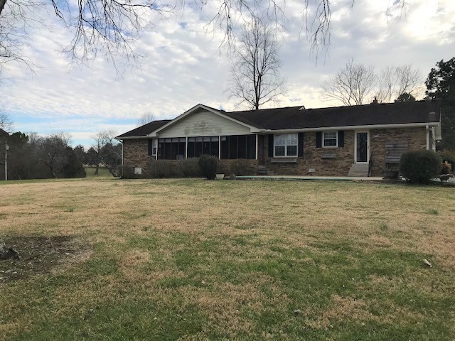 1931 Jarrell Road Lebanon, TN 37087 - Photo 7 of 35 a front view of a house with a yard
