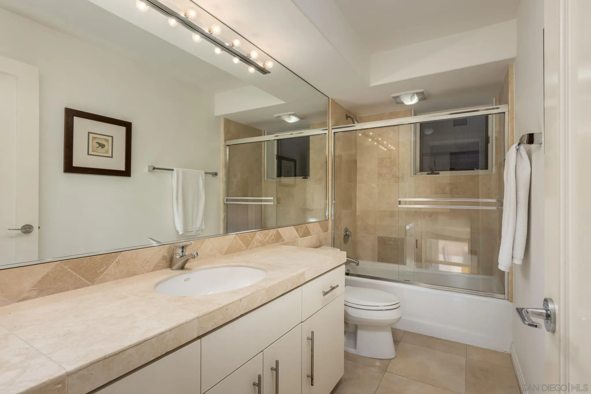 1722 Seaview Avenue Del Mar, CA 92014 - Photo 18 of 31 a bathroom with a sink a toilet and shower
