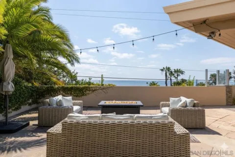 a view of a terrace with furniture