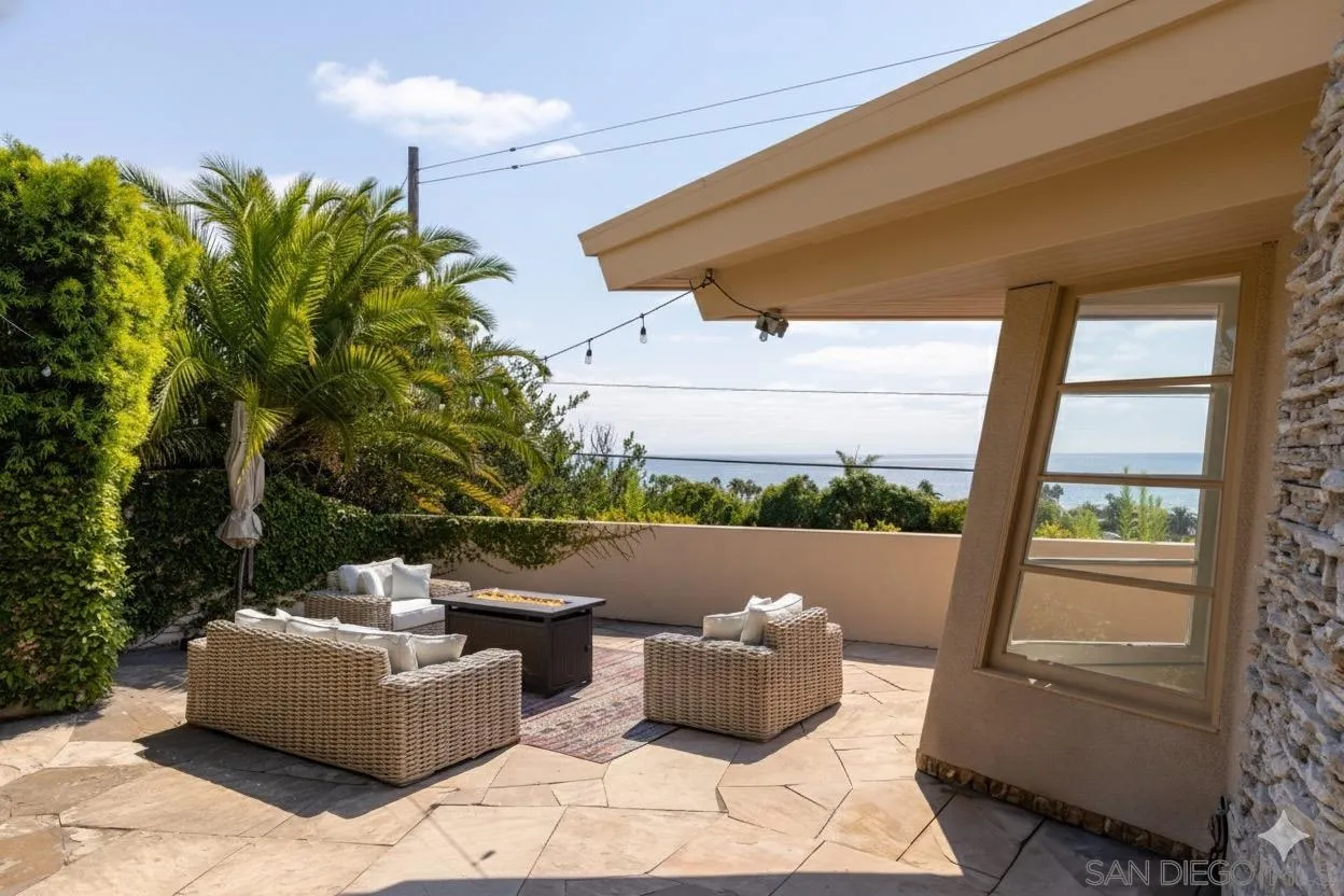 1722 Seaview Avenue Del Mar, CA 92014 - Photo 21 of 31 a view of patio with couches and potted plants