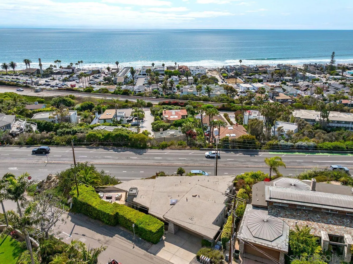 1722 Seaview Avenue Del Mar, CA 92014 - Photo 28 of 31 a view of a lake with a table and chairs