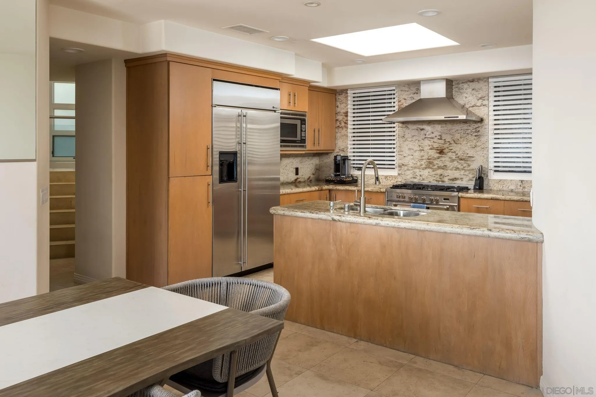 1722 Seaview Avenue Del Mar, CA 92014 - Photo 10 of 31 a room with sink table and chairs