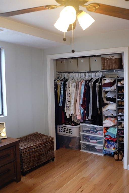 39 Parlin Street, Unit 605 Everett, MA 02149 - Photo 17 of 21 a view of walk in closet with clothes and shoes