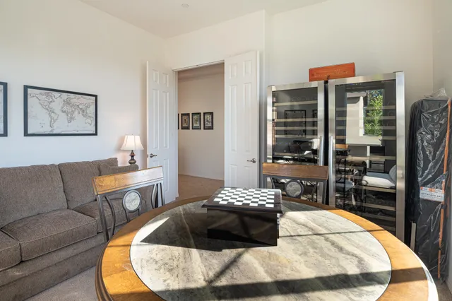 a living room with furniture and a couch