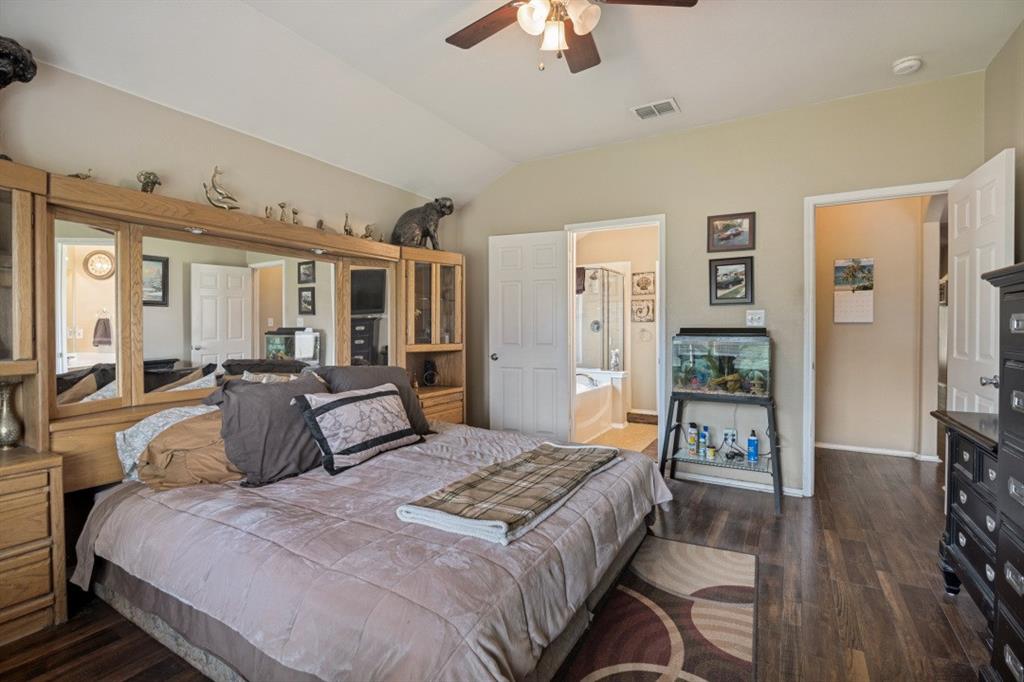 119 Robin Lane Forney, TX 75126 - Photo 13 of 27 Spacious room featuring wood-finish flooring, vaulted ceiling, and recessed lighting