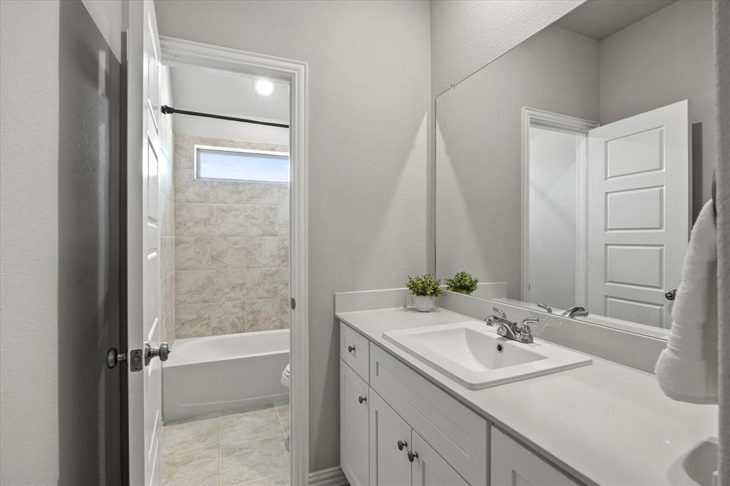 3506 Riley Street Fate, TX 75087 - Photo 19 of 28 Second Story Full Bathroom w/ dual sinks