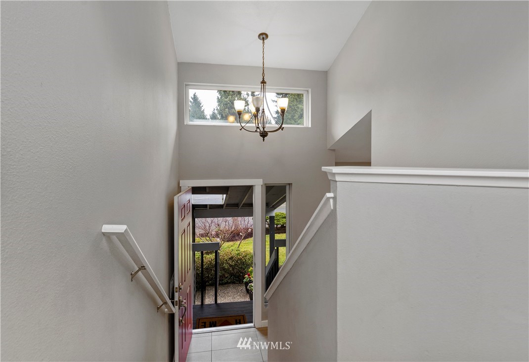 2612 170th Street Southeast Bothell, WA 98012 - Photo 3 of 21 a view of a hallway with chandelier