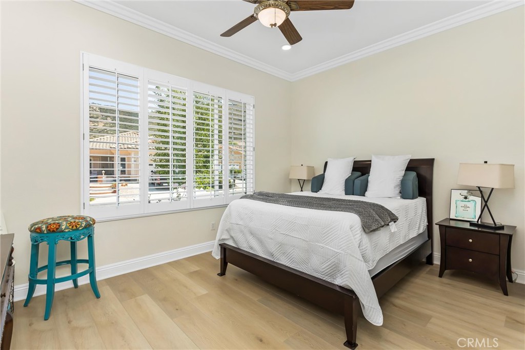 5233 Hampton Road Banning, CA 92220 - Photo 20 of 46 a bedroom with a bed and a table